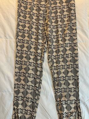 Divided Beige Slim Leg Pants with Black Geometric Print